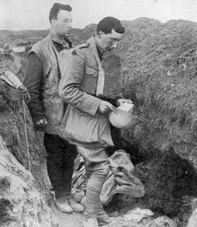 Chaplain of the 1st Munsters Saying a Burial Prayer Over Soldiers Killed in Their Trench by Unbekannt