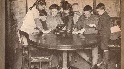 Children emptying their money-boxes to invest in war loan, c1917 by Unbekannt