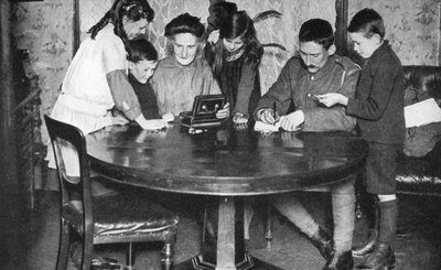 Children emptying their money boxes to invest in war bonds, 1936 by Unbekannt