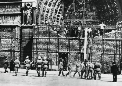 Clearing of sandbag protection from the facade of Notre Dame, German-occupied Paris by Unbekannt