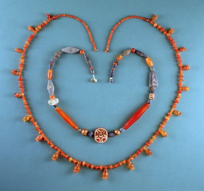 Cornelian Necklace from Tell Farah (South), Israel, c.1300 BC; Lapis Lazuli, Cornelian and Etched Cornelian Necklace from Kish, Iraq, c.2500 BC by Unbekannt