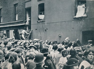 Crowd watching the looting of a German house in Poplar, c1914 by Unbekannt