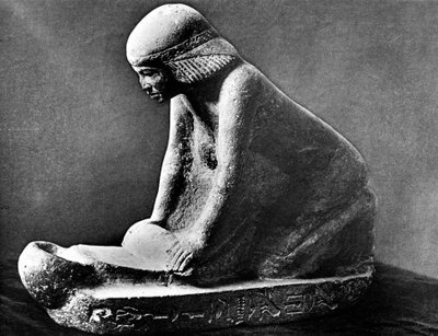 Egyptian Tomb Figure of a Woman Grinding Corn Using a Saddle Quern by Unbekannt