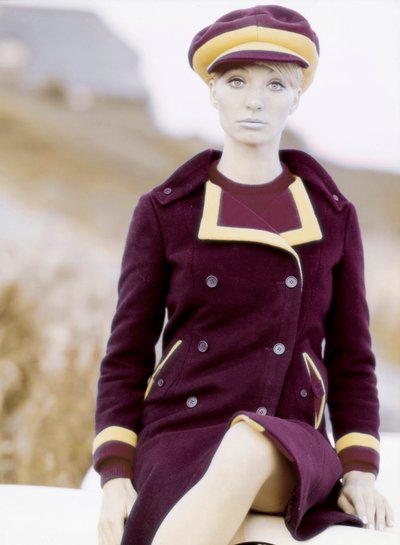 Fashion: young woman wearing a cap and a coat, late 1960s-early 1970s by Unbekannt
