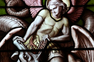 Basilica Notre-Dame of Geneva. Stained glass window. Angel fighting Satan as a dragon. by Unbekannt