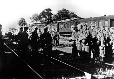 German Soldiers Awaiting Transportation in a Railway Station in the Paris Suburbs by Unbekannt