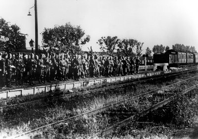 German Soldiers on a Railway Platform Awaiting Transport, France, August 1940 by Unbekannt