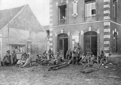 German Troops Sitting on the Steps of the Vareddes Town Hall, France by Unbekannt