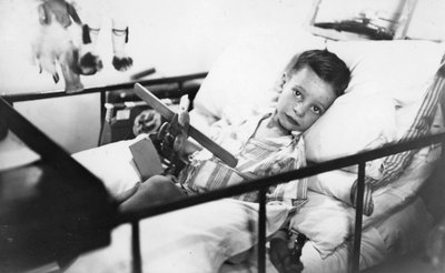 Greek Boy from Pylos Being Nursed in the Sick Bay of the British Battleship HMS Malaya by Unbekannt