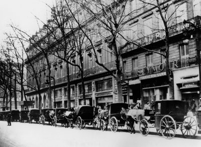 Horse-drawn cabs on a street during the German occupation, Paris, 1944 by Unbekannt
