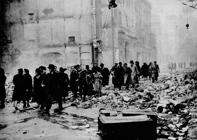 In the morning, work as usual. After a big raid, the way to the office is knee-deep in rubble by Unbekannt