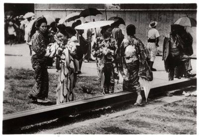 Japanese Women by the Zeppelin Hangar, Kasumigaura, Japan by Unbekannt