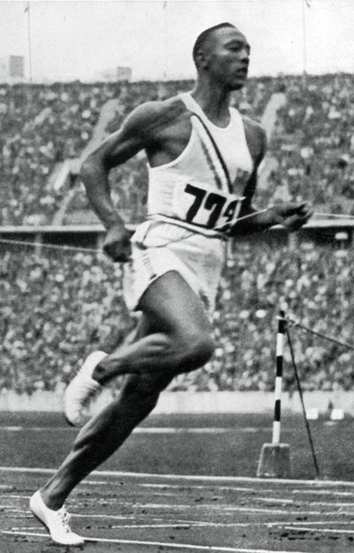 Jesse Owens at the End of the 100m at the Berlin Olympic Games, 1936 by Unbekannt