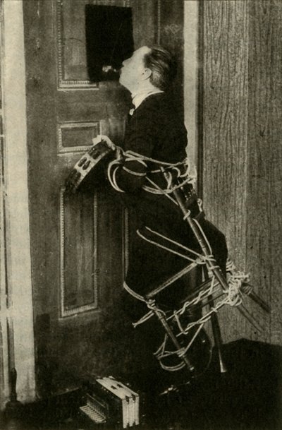 John Nevil Maskelyne Performs a Spirit Cabinet Illusion by Unbekannt
