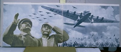 Joseph Stalin & Maxim Gorky observing an aeroplane bearing the name of the writer, illustration from 