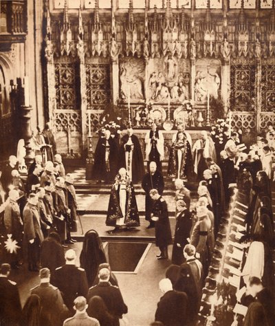 King Edward VIII sprinkles earth on his father