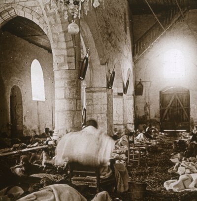 Makeshift hospital in a church, Marne, northern France, 1914 by Unbekannt