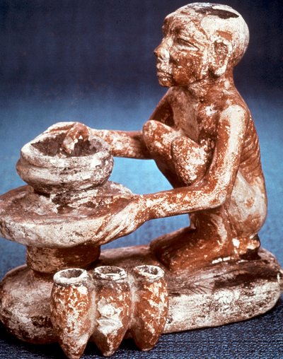 Potter turning vessels on a wheel, Ancient Egyptian, Old Kingdom, 5th Dynasty 2565-2420 BC by Unbekannt