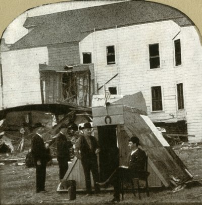 Refugees Camp, Former Dwelling in Ruins in Background by Unbekannt
