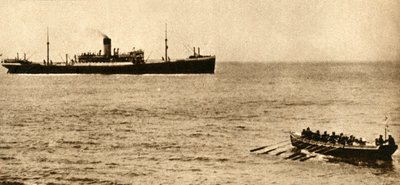 Royal navy cutter about to examine a ship
