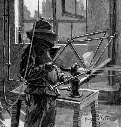 Sandblasting the Joints of a Bicycle Frame, France by Unbekannt