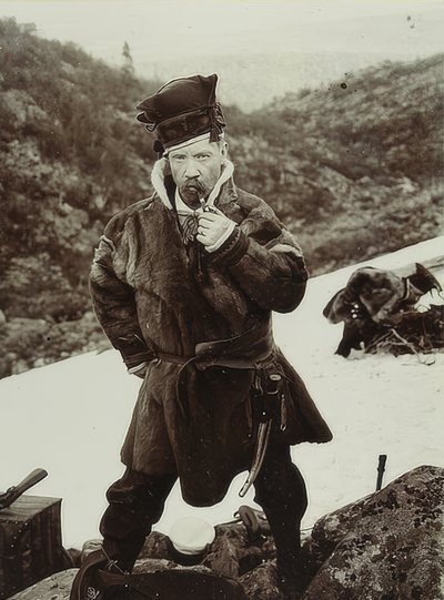 Sweden. Pipe-Smoking Sami with Typical Headgear. Around 1900 by Unbekannt