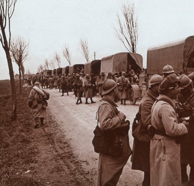 Soldiers and column of trucks on the Voie Sacrée, Verdun, northern France by Unbekannt