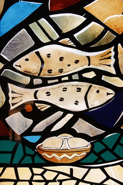 Stained glass: Christian symbols: the fish, symbolizing early Christians, Togoville, Togo by Unbekannt
