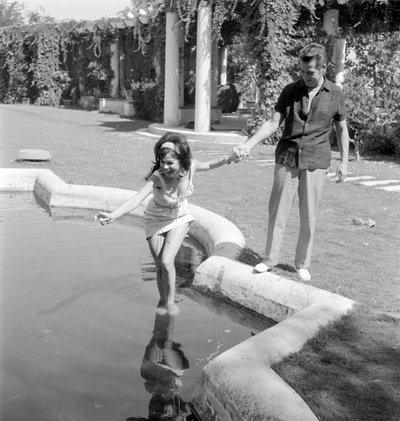 The Actress Laya Raki with the Actor Ron Randell at Venice Lido - 1961 by Unbekannt