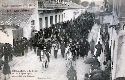 The French Foreign Legion Parading Through the Streets of Sidi Bel Abbes, Algeria by Unbekannt