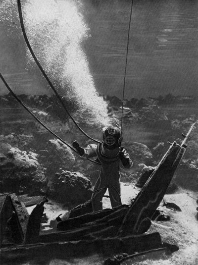 The First Photograph of a Diver Under Water by Unbekannt