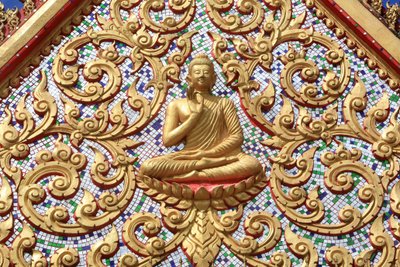 The first sermon of Buddha after reaching Enlightenment, Wat Si Sou Mang Karam Temple, Vieng Vang, Laos by Unbekannt