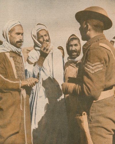 Tunisian Arabs Welcome a British Sergeant at Chaouach, 1943 by Unbekannt