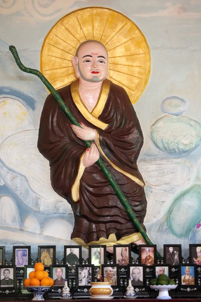 Van Hanh Zen Buddhist Monastery. Buddhist Monk Over Vietnamese Altar for Ancestors. The Veneration of the Dead. Dalat, Vietnam by Unbekannt
