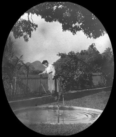 Woman by a Pond in a Garden, Rio de Janeiro, Brazil by Unbekannt