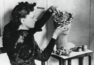 Woman Making a Hat from Wood Shavings, German-occupied France by Unbekannt