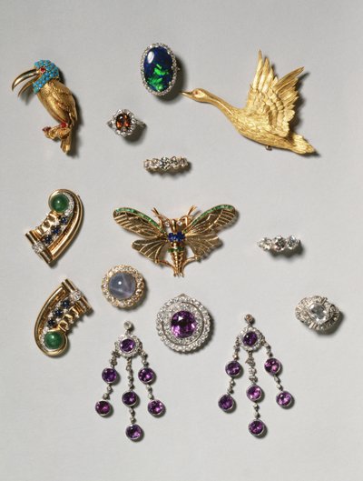 Selection of jewellery: amethyst and diamond chandelier earrings; cabochon star sapphire and diamond brooch; black opal ring; amethyst and diamond brooch or pendant; gold flying swan clip brooch; Tiffany & Co. by Unbekannt Unbekannt