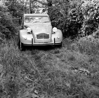 A family Travelling in their Citroen 2CV, Monza by Bartolome Esteban and studio Murillo
