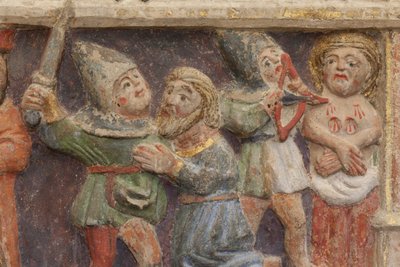 Altarpiece. polychrome stone. Second half 14th century. Origin former parish church of Torre de Rialb. (detail) Mid register. Left panel. Lower part: an official is looking at the scene at the beheading of Saint Iscle and the amputation of the breasts of S by Unbekannt