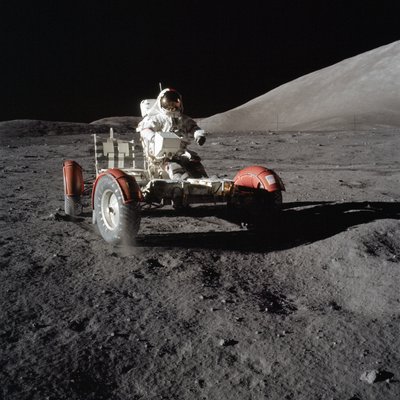 Astronaut Eugene Cernan drives the Lunar Roving Vehicle during first EVA by Unbekannt