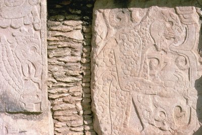 Bas relief depicting jaguars pulling out human hearts from sacrificial victims by William M. Timlin