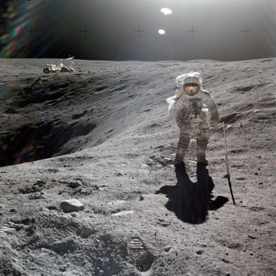 Charles M. Duke, Jr., lunar module pilot of the Apollo 16 mission, collecting lunar samples at the rim of Plum Crater, April 1972 by Unbekannt