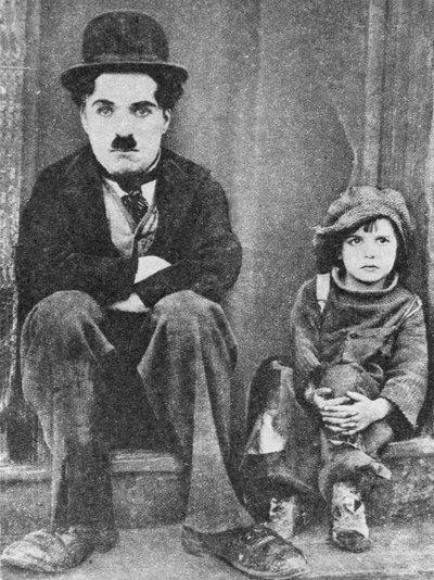 Charlie Chaplin and Jackie Coogan in The Kid by Unbekannt
