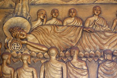 Chua Thiep Long buddhist pagoda. Reclining Buddha. After 45 years of teaching the Dharma, the Buddha passed into Parinirvana. Statue. Thay Ninh, Vietnam by Unbekannt