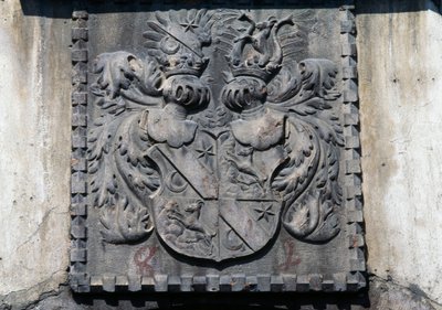 Coat of arms on wooden door of home in Lavis, Trento, Trentino-Alto Adige, Italy by Benjamin Baud