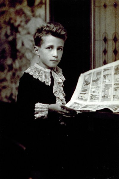 Half-Length Portrait of a Boy Leafing Through a Comic Book by Unbekannter Künstler