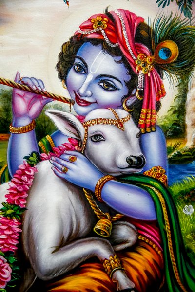 Hindu god Krishna with a calf. Watford, U.K. by Unbekannt