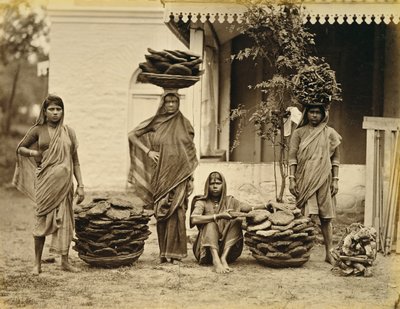 Indian Peasant Women with Baskets of Dung Cakes and Kindling Wood by Unbekannt