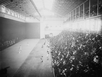 Jai alai is a sport involving a ball bounced off a walled space by accelerating it to high speeds with a hand-held device (cesta) by Unbekannt
