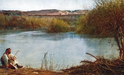 Jordan river - Arab hunter seated on river bank by Unbekannter Künstler